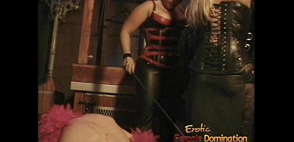  Two naughty studs enjoy having some dungeon fun with a hot domina